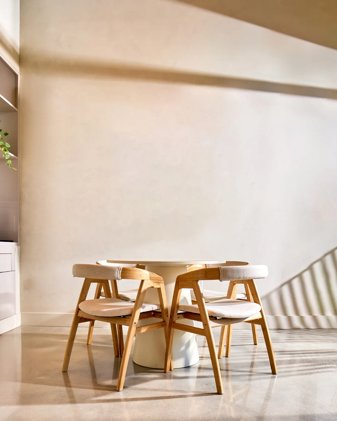 Dining area with banquette seating and arches